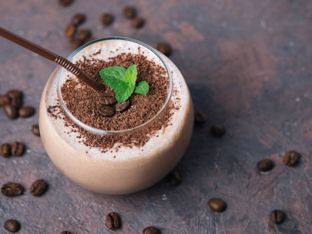 istock Chocolate smoothie with coffee, cocoa and milk sprinkled with chocolate chips 1160975553