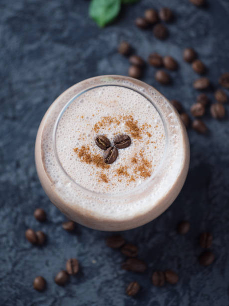 istock Coffee smoothie with chocolate and milk on a concrete table close-up 1160975561