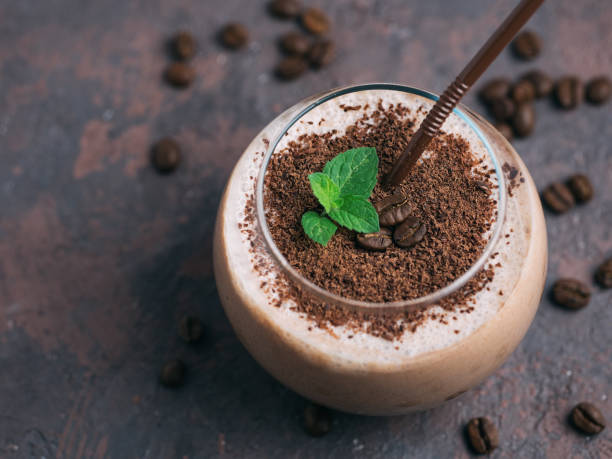 istock Chocolate smoothie with coffee, cocoa and milk sprinkled with chocolate chips 1160975563