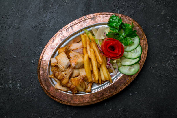 istock Doner with chicken on copper plate turkish cuisine 1160976487