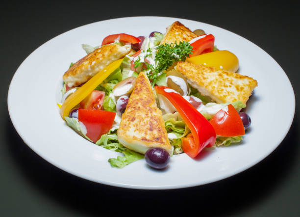 istock Tasty cheese salad on plate 1160976495