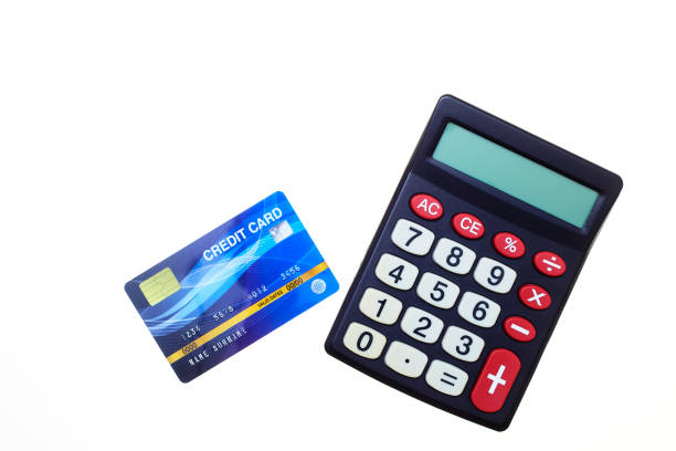 istock Top view Credit card with Calculator On white background 1160976616