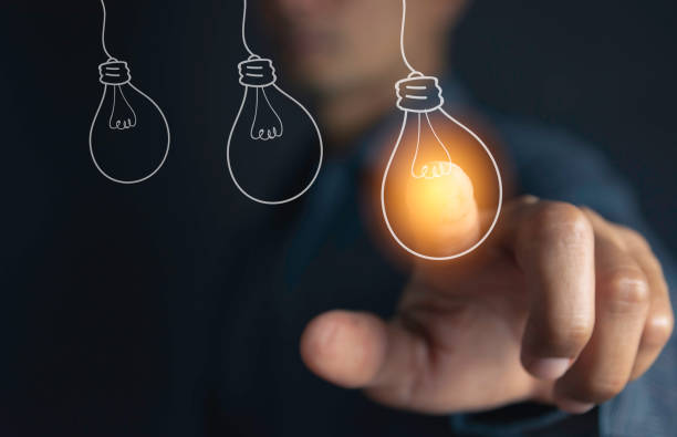 istock Innovation or creative concept of hand hold a light bulb and copy space for insert text. 1160985232