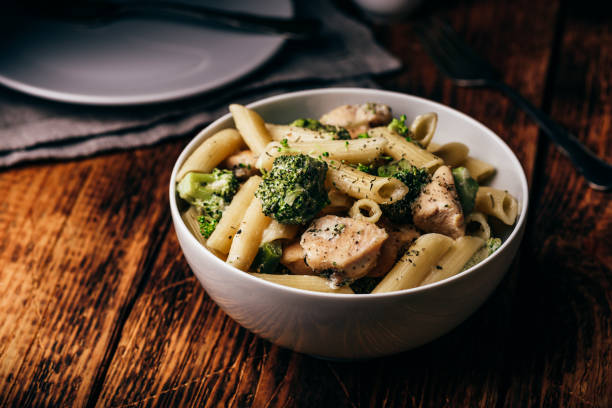 istock Pasta with chicken and broccoli 1160990661