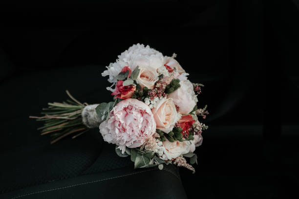 istock bridal bouquet in a car seat 1160996647