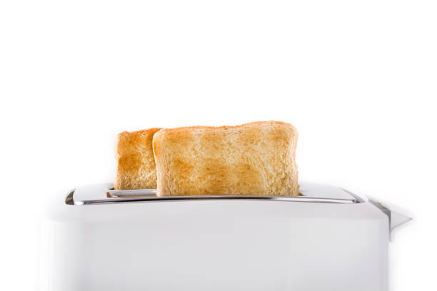 istock Toasted toast bread in white toaster 1160998382