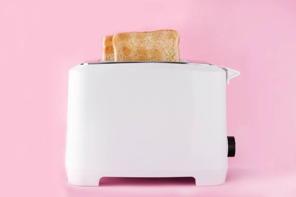 istock Toasted toast bread in white toaster 1160998445