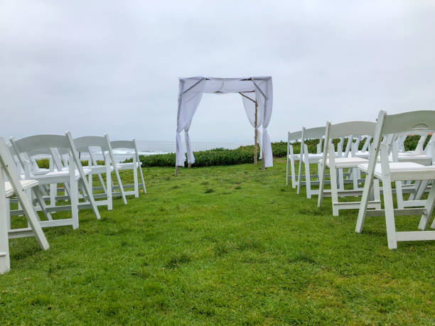 istock Wedding ceremony setting in front of the ocean 1160999615
