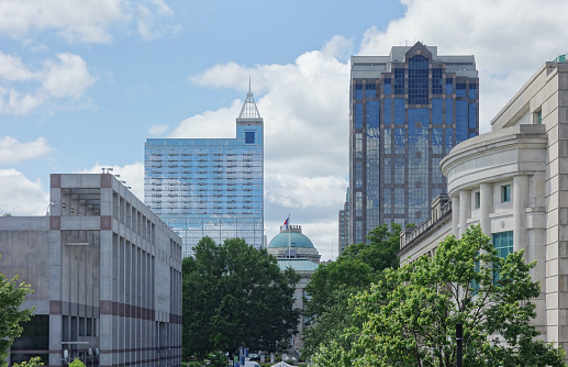 View of downtown Raleigh NC with the green dome of the State Capitol building in the center
