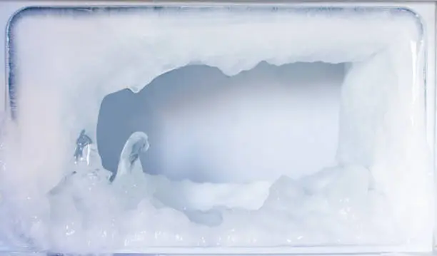 Photo of White ice in the refrigerator,Copy space,Closeup