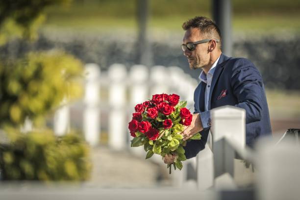 istock Attractive Men with Flowers 1161001065
