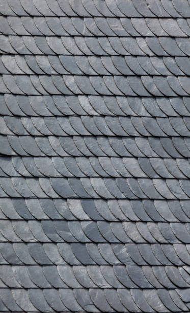 istock detail of grey slate roofing 1161001108