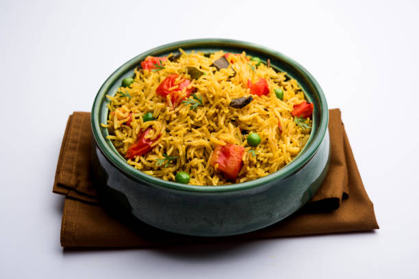 istock Tomato  pulav/Pilaf made using basmati rice, served in a bowl. selective focus 1161004811