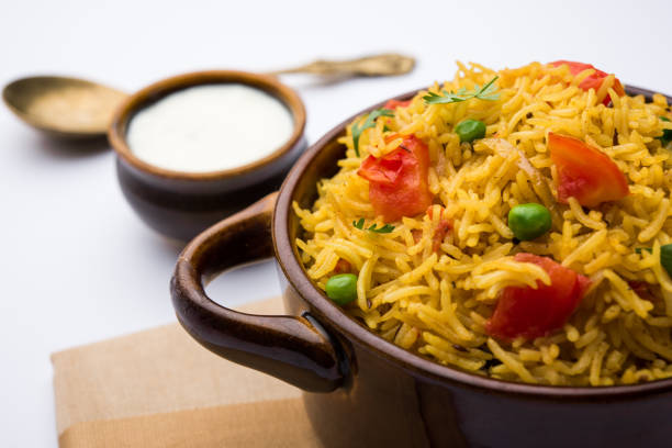 istock Tomato  pulav/Pilaf made using basmati rice, served in a bowl. selective focus 1161005995