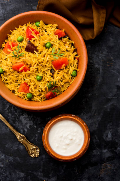 istock Tomato  pulav/Pilaf made using basmati rice, served in a bowl. selective focus 1161006410