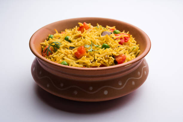 istock Tomato  pulav/Pilaf made using basmati rice, served in a bowl. selective focus 1161007835