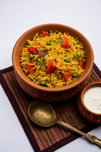 istock Tomato  pulav/Pilaf made using basmati rice, served in a bowl. selective focus 1161008138