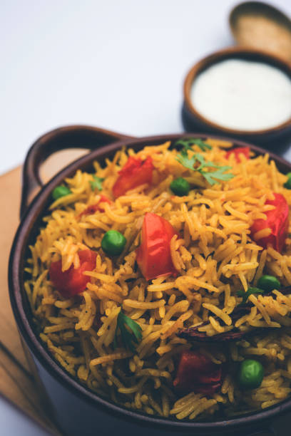 istock Tomato  pulav/Pilaf made using basmati rice, served in a bowl. selective focus 1161008183