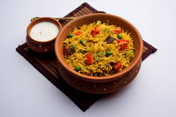 istock Tomato  pulav/Pilaf made using basmati rice, served in a bowl. selective focus 1161008203