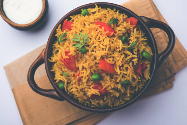 istock Tomato  pulav/Pilaf made using basmati rice, served in a bowl. selective focus 1161008285