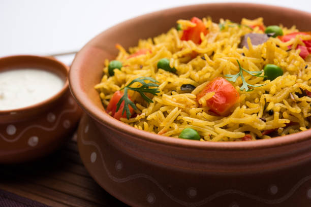 istock Tomato  pulav/Pilaf made using basmati rice, served in a bowl. selective focus 1161008374