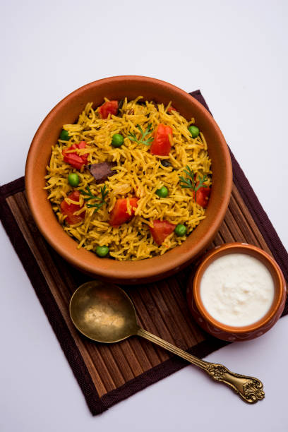 istock Tomato  pulav/Pilaf made using basmati rice, served in a bowl. selective focus 1161008399
