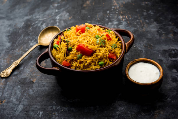 istock Tomato  pulav/Pilaf made using basmati rice, served in a bowl. selective focus 1161009011