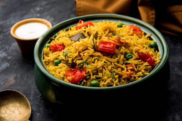 istock Tomato  pulav/Pilaf made using basmati rice, served in a bowl. selective focus 1161009090