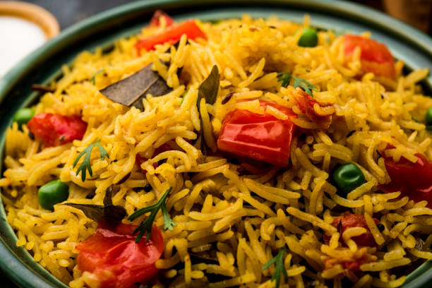 istock Tomato  pulav/Pilaf made using basmati rice, served in a bowl. selective focus 1161009115