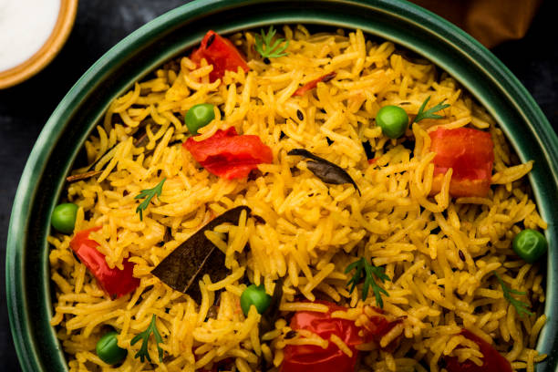istock Tomato  pulav/Pilaf made using basmati rice, served in a bowl. selective focus 1161009466