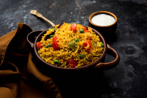 istock Tomato  pulav/Pilaf made using basmati rice, served in a bowl. selective focus 1161009530
