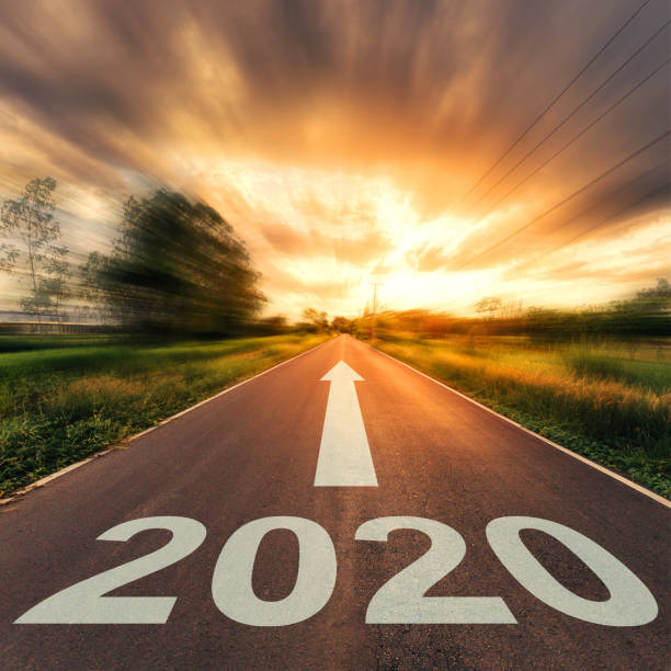 istock New Year Concept : Empty asphalt road sunset and New Year 2020. 1161009537