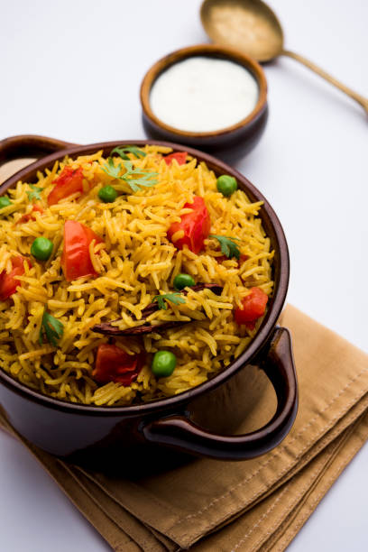 istock Tomato  pulav/Pilaf made using basmati rice, served in a bowl. selective focus 1161009703