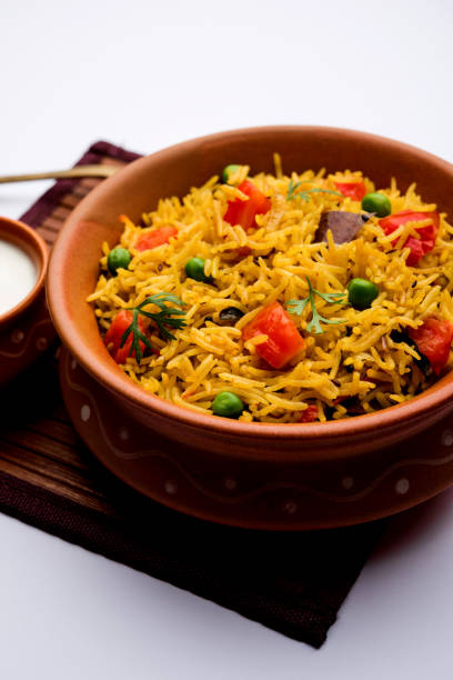 istock Tomato  pulav/Pilaf made using basmati rice, served in a bowl. selective focus 1161009748