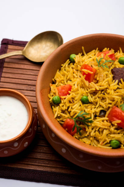 istock Tomato  pulav/Pilaf made using basmati rice, served in a bowl. selective focus 1161009815