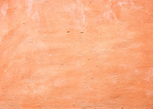 istock Texture of old wall covered with brown stucco 1161010565