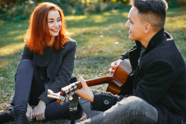 istock Beautiful couple spend time in a summer park 1161010749