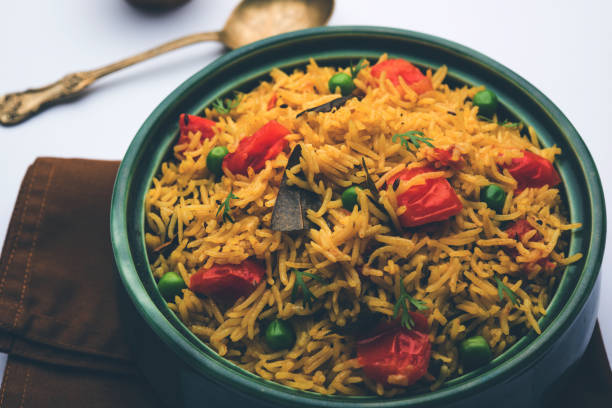 istock Tomato  pulav/Pilaf made using basmati rice, served in a bowl. selective focus 1161010751