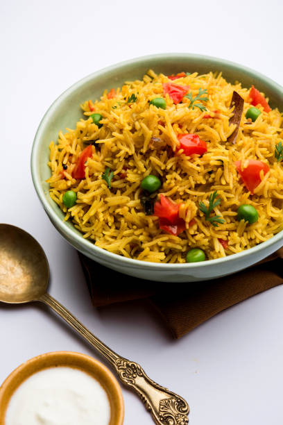 istock Tomato  pulav/Pilaf made using basmati rice, served in a bowl. selective focus 1161011017