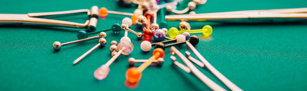 istock Body piercing background jewelry rings puncturing implants | Blurry Background 1161011340