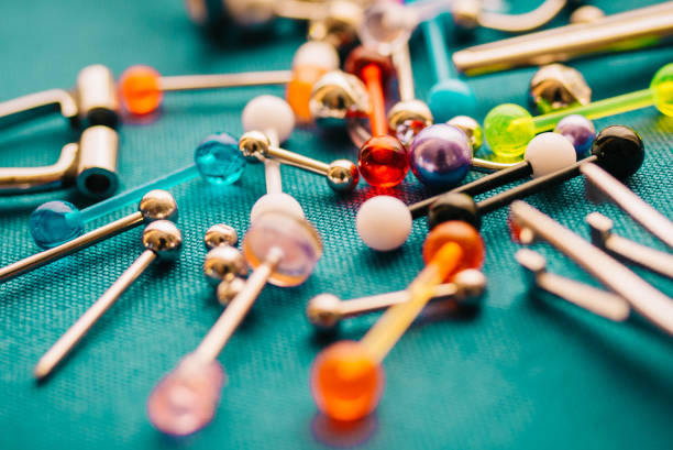 istock Body piercing background jewelry rings puncturing implants | Blurry Background 1161011867