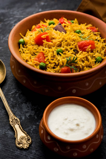 istock Tomato  pulav/Pilaf made using basmati rice, served in a bowl. selective focus 1161011918