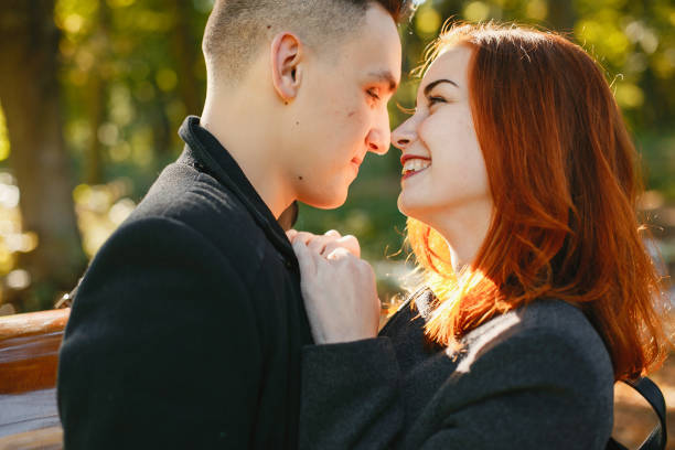 istock Beautiful couple spend time in a summer park 1161011959