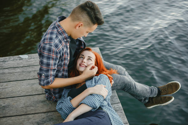 istock Beautiful couple spend time near a water 1161013231