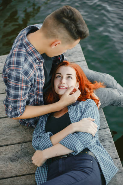 istock Beautiful couple spend time near a water 1161013254