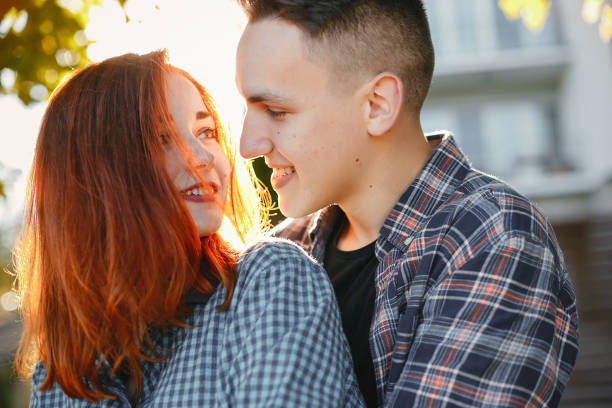 istock Beautiful couple spend time in a summer park 1161013436