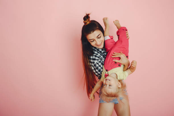 istock Mother and daughter have fun in a studio 1161014539