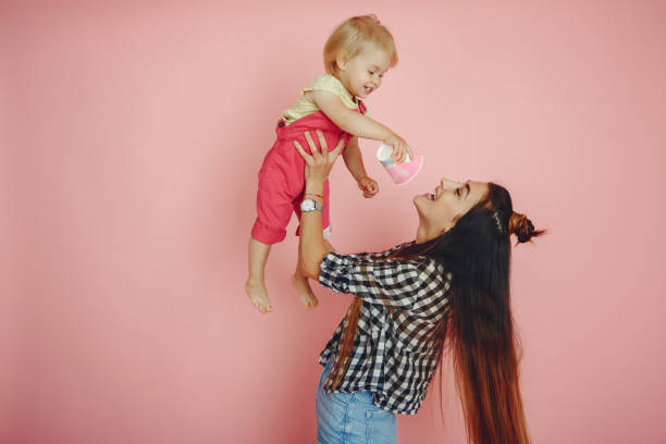 istock Mother and daughter have fun in a studio 1161014571