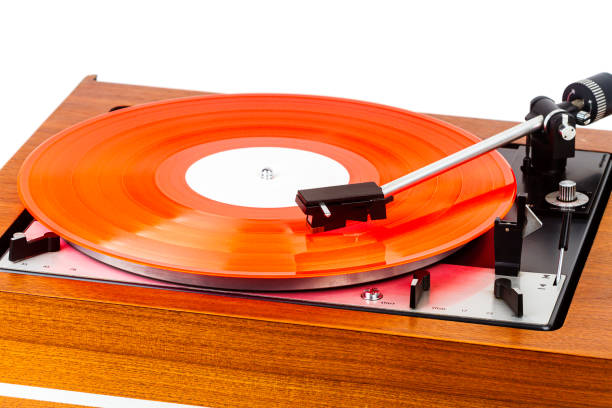 istock Vintage turntable with a red vinyl isolated on white 1161014672
