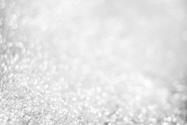 istock Abstract of Bright and sparkling bokeh background. silver and diamond dust bokeh blurred lighting from glitter texture 1161014719